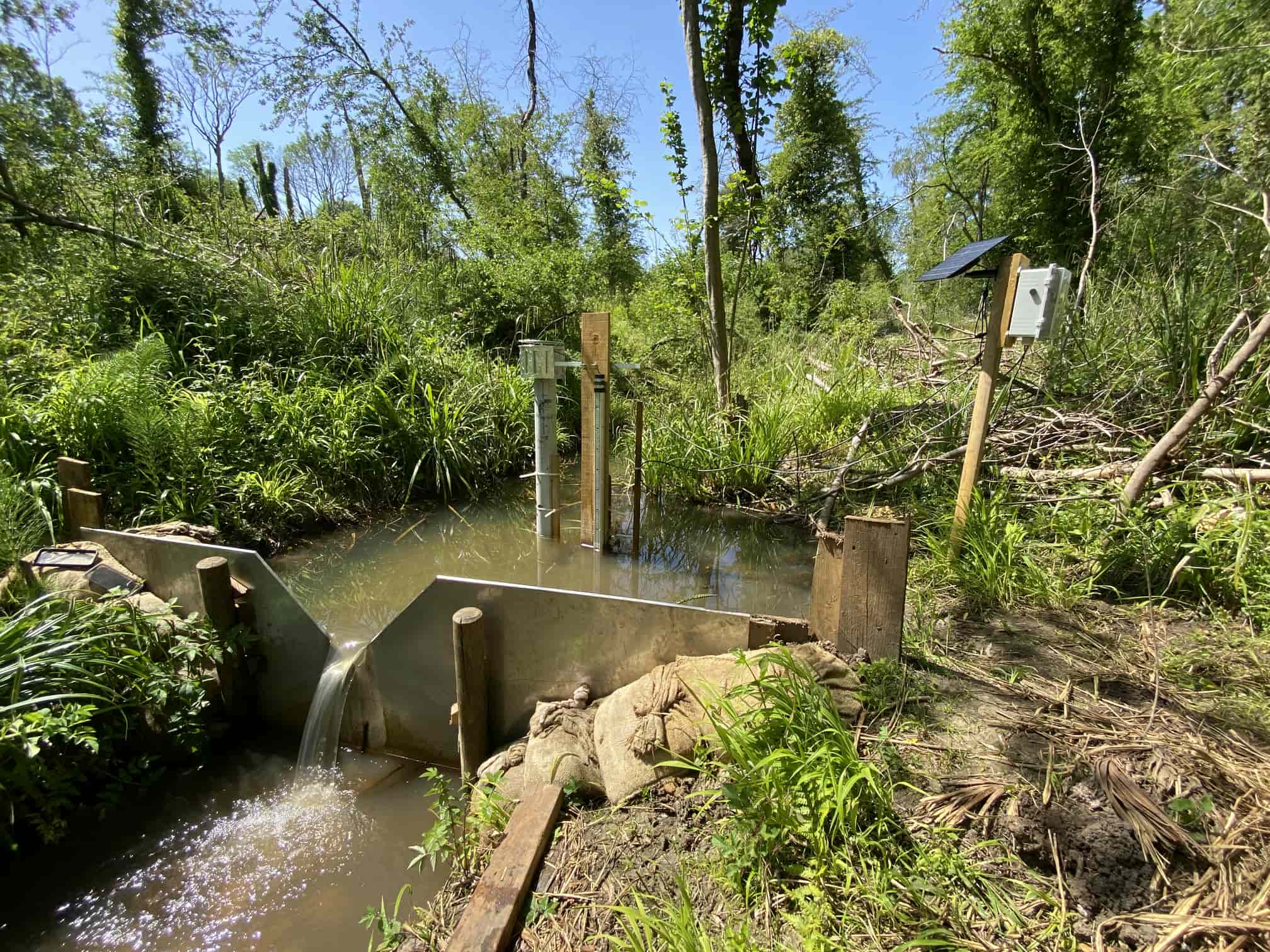 Outfall V-notch weir at the bottom of the valley